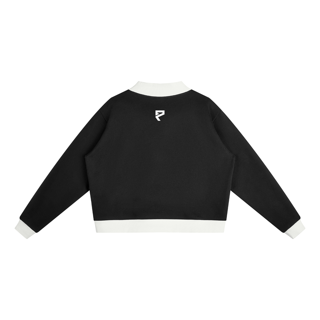 St. Padel Mock Neck Pullover. A black long-sleeve cropped sweatshirt shown from the back, featuring a white ribbed collar, hem, and cuffs, with a small white stylized 'P' logo centered above the back neckline.
