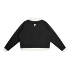 St. Padel Mock Neck Pullover. A black long-sleeve cropped sweatshirt shown from the back, featuring a white ribbed collar, hem, and cuffs, with a small white stylized 'P' logo centered above the back neckline.
